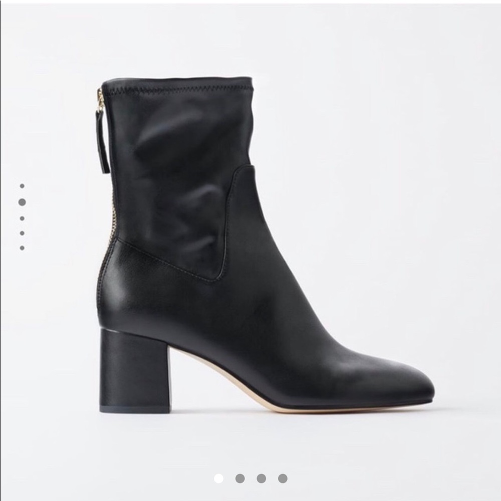 Zara heeled zippered ankle boots.